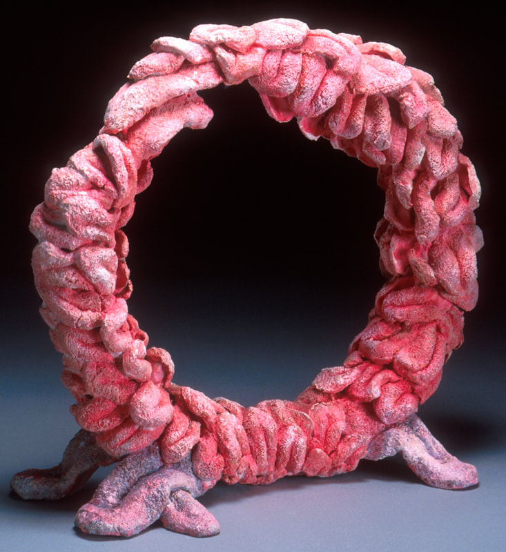 Circle of Fire (Taste III) 1999,	Ceramic Earthenware Paper clay,	53 x 57 x 24 cm \ 21 x 22 x 9 inches, Photo: 	Victor France. Exhibited: Tempus Fugit, Gomboc Gallery, Inaugural Art Exhibition: City of Joondalup