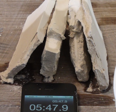 Picture: Image 3: Always test the tensile strength of completely dry joins to discover the ideal duration to soak that particular paper clay (or thickness) prior to joining, to create the strongest joins. In this example the piece on the right was soaked for two minutes longer than the other piece, before joined together with soft paper clay between them, After completely drying, I bent the work and the join broke on the left side of the joining soft paper clay coil (marked with two small black marks).